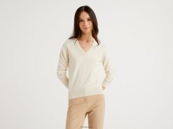 kremhvit Benetton kvinner krem genser med v-hals i ren merinoull 20TRB3675